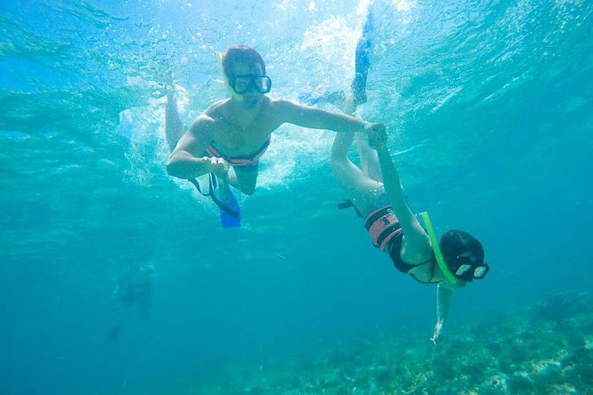 Afternoon Half-Day Catmaran Sailing and Snorkel Adventure - Snorkeling Near Isla Mujeres: Included Gear, Crowds, and Safety Reality