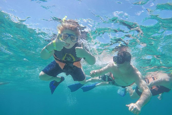 Afternoon Half-Day Catmaran Sailing and Snorkel Adventure - Getting to the Catamaran: Lobster Beach and the Real Pick-Up Vibe