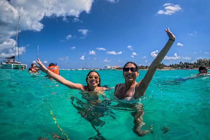 All-Inclusive Isla Mujeres Catamaran with Free Transportation - Blanquizal Sandbar swim stop: quick turquoise-water payoff
