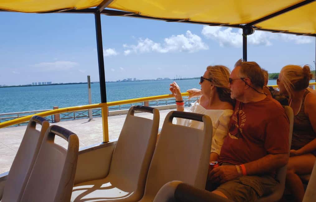 Cancun: Guided City Tour with Shopping by Double Decker Bus - The downtown-to-Hotel Zone loop on Boulevard Kukulcan