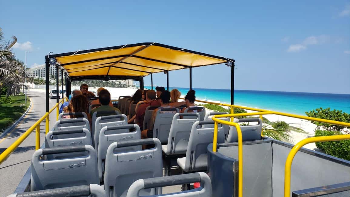 Cancun: Guided City Tour with Shopping by Double Decker Bus - Tequila tasting at Plaza La Fiesta: included, but go in ready