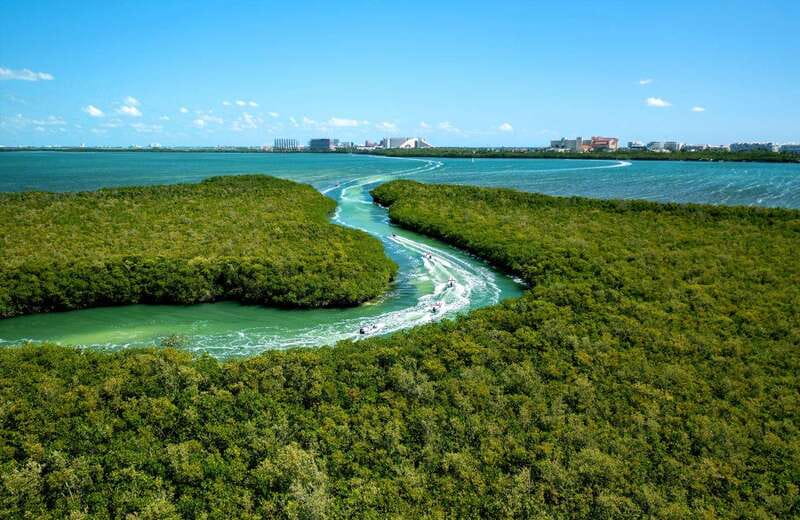 Cancun: Jungle Tour Adventure with Speedboat and Snorkeling - Snorkeling at Punta Nizuc: fish-first, time-limited