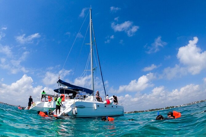 Cancun Sailing Catamaran Islas Mujeres With Luxury Beach Club - The Catamaran Ride: Food, Drinks, and When the Day Starts Moving