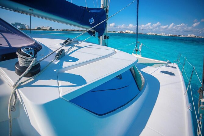 Cancun Sailing Catamaran Islas Mujeres With Luxury Beach Club - Open Bar After Snorkeling: Fun Factor With a Timing Catch