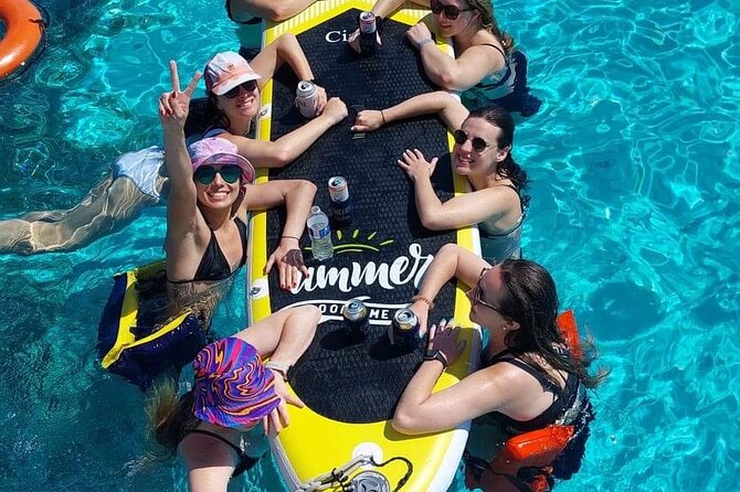 Cancun to Isla Mujeres Private Catamaran Cruising Snorkeling Fun! - Onboard hosts, photo-friendly service, and that golf-cart advantage