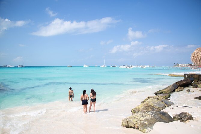 Catamaran Sailing to Isla Mujeres with Snorkeling, Lunch & Open Bar included - Isla Mujeres Arrival: Beach Club Access and Buffet Lunch