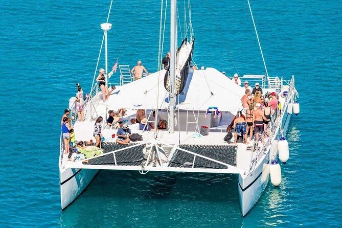 Catamaran Tour to Isla Mujeres from Cancún with Bar and Lunch - Isla Mujeres town time: souvenir browsing, with a heads-up on where you land