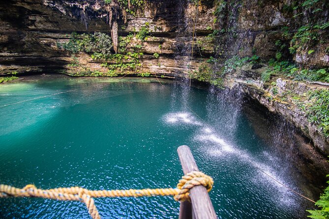 Chichen Itza, Cenote, and Valladolid Tour - Cenote Chichikán: cold water, stone steps, and mandatory life jackets