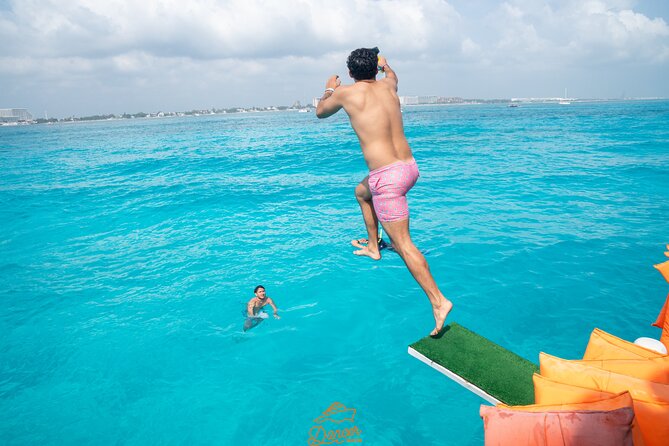 Dancer Cruise Isla Mujeres Snorkel Food and Drinks Included - Stop 3: Isla Mujeres Free Time + Party Energy on the Way Back