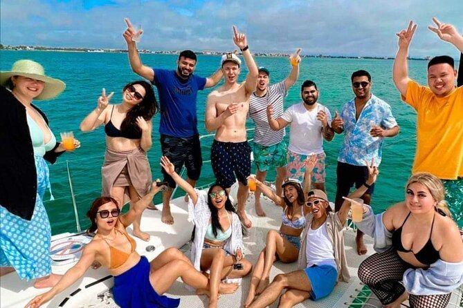 Deluxe Catamaran to Isla Mujeres, with Drinks, Snorkel & Buffet - The beach club and Mexican buffet: what comes next after the island