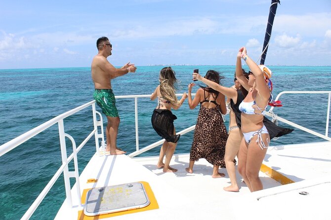 Deluxe Catamaran to Isla Mujeres with Open Bar from Cancun - Isla Mujeres Snorkeling Stop: What to Expect in the Water