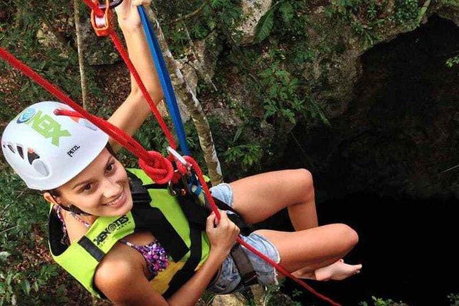 Drive an Atv shared, swim in a Cenote and ziplines in the Cancun - Zip lines with safety gear: Serious setup, not just a photo stop