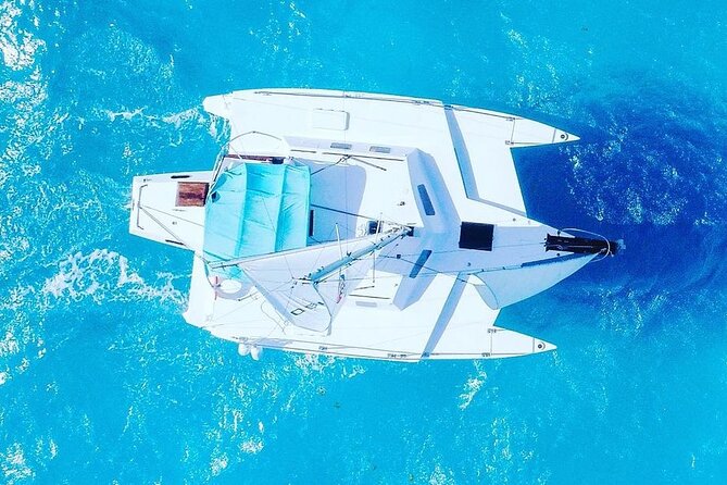 Exciting Catamaran Tour to Isla Mujeres, from Cancún! - Beach club buffet lunch: included food, real-world logistics
