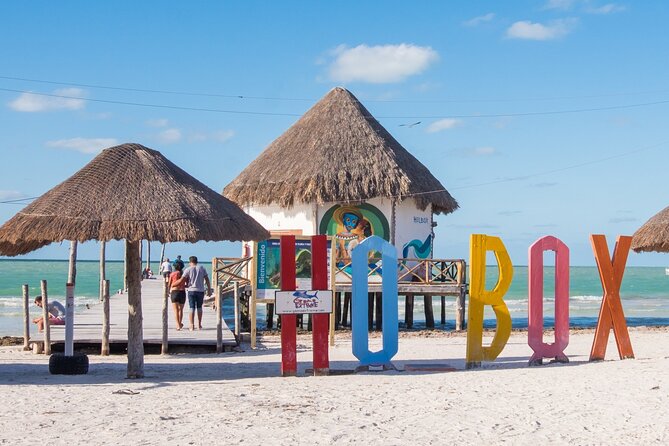 Full Day Tour to the Best of Holbox - Yalahau Lagoon and Ojo de Agua: your swim payoff
