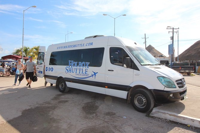 Holbox Cancun Airport Shuttle Terminal 2 - The Ride: Air-Conditioned Comfort Meets Real Road Conditions