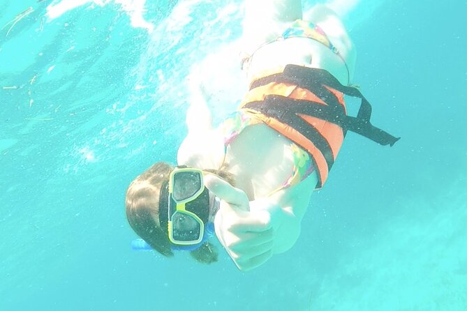 Isla Mujeres Catamaran Tour from Cancun with Snorkel and Open Bar - Spinnaker Flying: The Weather-Dependent Thrill