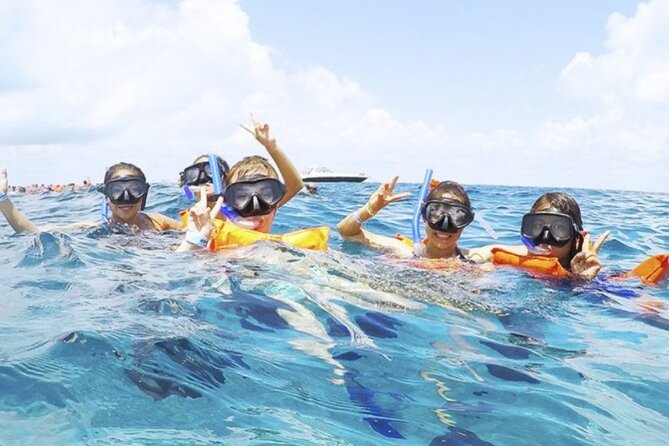 Isla Mujeres Catamaran Tour with Snorkel, Open bar and Transport - Playa Norte: shallow anchoring time near one of the most famous beach spots