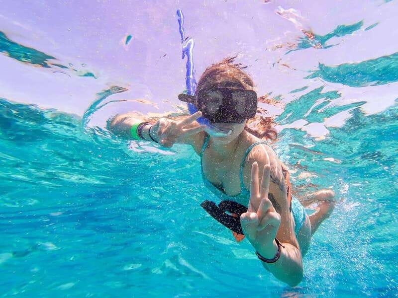 Isla Mujeres: Catamaran with Open Bar, Snorkeling and Lunch - The sailing back to Cancun: timing, sunset energy, and drop-offs