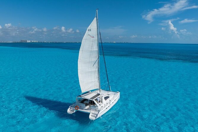 Isla Mujeres Day Tour with Catamaran, Snorkeling & Beach Club - From Marina Las Perlas to Isla Mujeres: your 7.5-hour flow