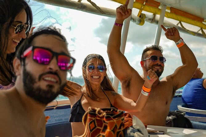 Isla Mujeres Island and Snorkeling Tour - Isla Mujeres downtown: Magic Town energy, Malecón stroll, ice cream