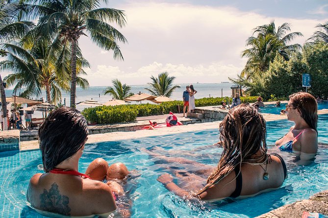 Isla Mujeres luxury catamaran with premium open bar and lunch - Isla Mujeres downtown stop: 1 hour to shop, swim, or just wander