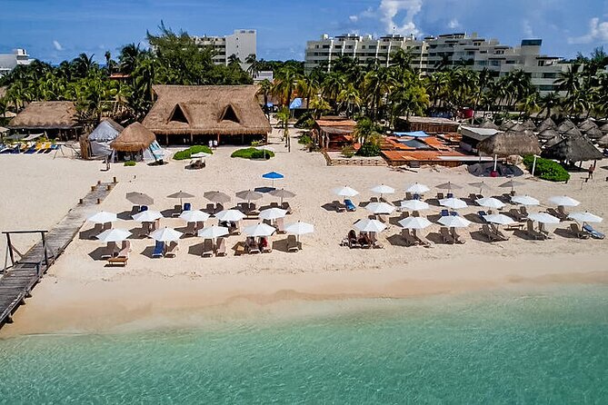 Isla Mujeres luxury catamaran with premium open bar and lunch - The beach club break at Zama or IXI: relaxing, but not always fully exclusive