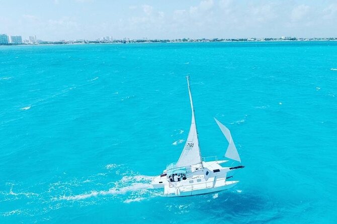 Isla Mujeres Premium Tour in Private Catamaran with Lunch - Stop 1: Playa Tortugas for 30 minutes of easy setup time