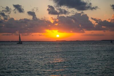Isla Mujeres Sunset Cruise and Tour from Cancun - Onboard catamaran vibe: drinks, music, and that safety-first feeling