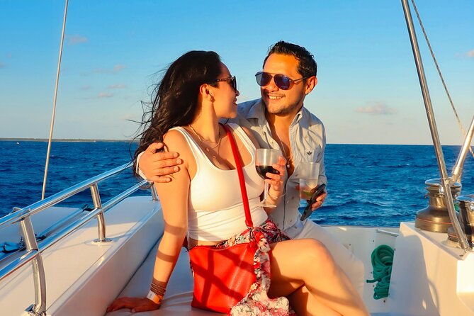 Luxury Sunset Sailing Cruise in Cancun with Light Dinner and Open Bar - Photos and extra costs: the $10 government fee and the photo upsell