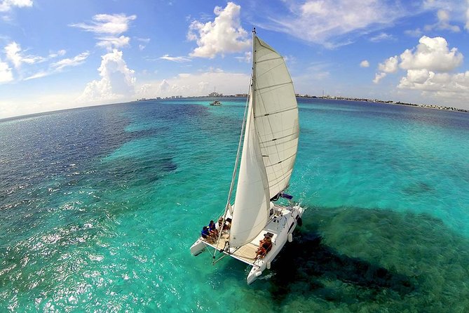 Private Catamaran from Cancun to Isla Mujeres for up to 13 People - Unlimited drinks, but with a captain’s mindset