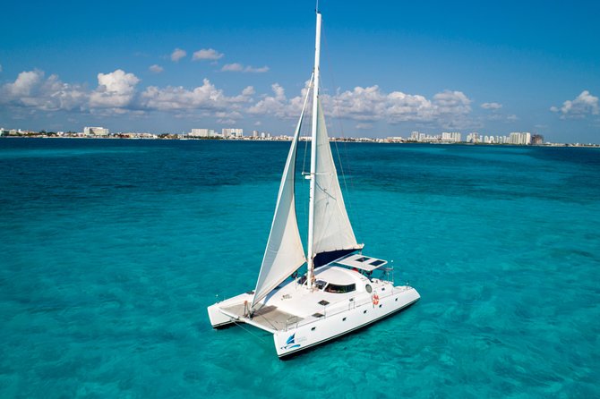 Private Catamaran from Cancun to Isla Mujeres | For up to 40 pp - Playa Norte swim time: short, classic, and very turquoise-coded