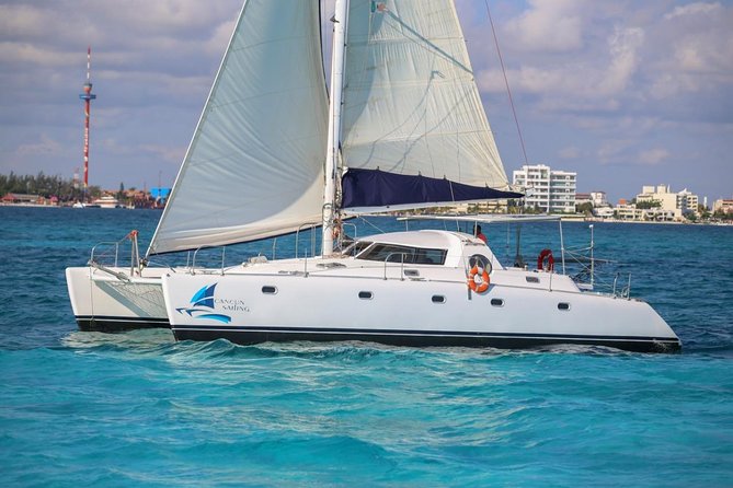 Private Catamaran from Cancun to Isla Mujeres | For up to 40 pp - Included extras that matter: open bar, snorkeling gear, and spinnaker fly time