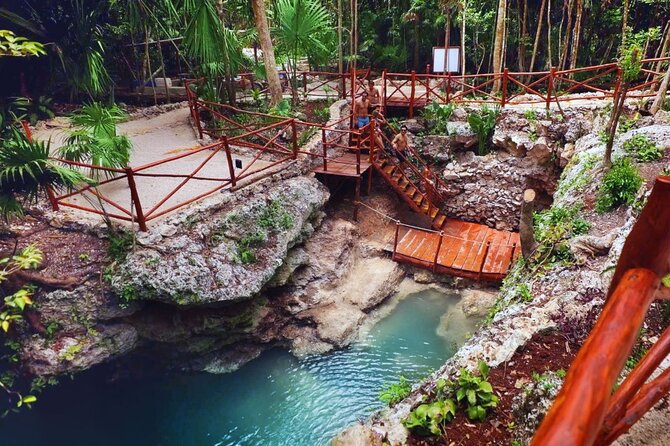 Small Group 3 Waterfall Cenotes Experience - The zipline and jumping platform: fun, but bring the right mindset
