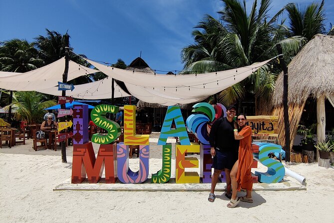 Top Isla Mujeres Catamaran Tour with Snorkel Open Bar and Buffet lunch - Free time on Isla Mujeres: make the most of 90 minutes