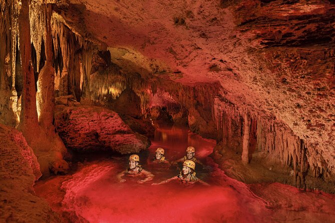 Xplor Fuego with Buffet Style Dinner and transportation - The evening circuit: cave rafting, amphibious rides, zip lines, and swim stops